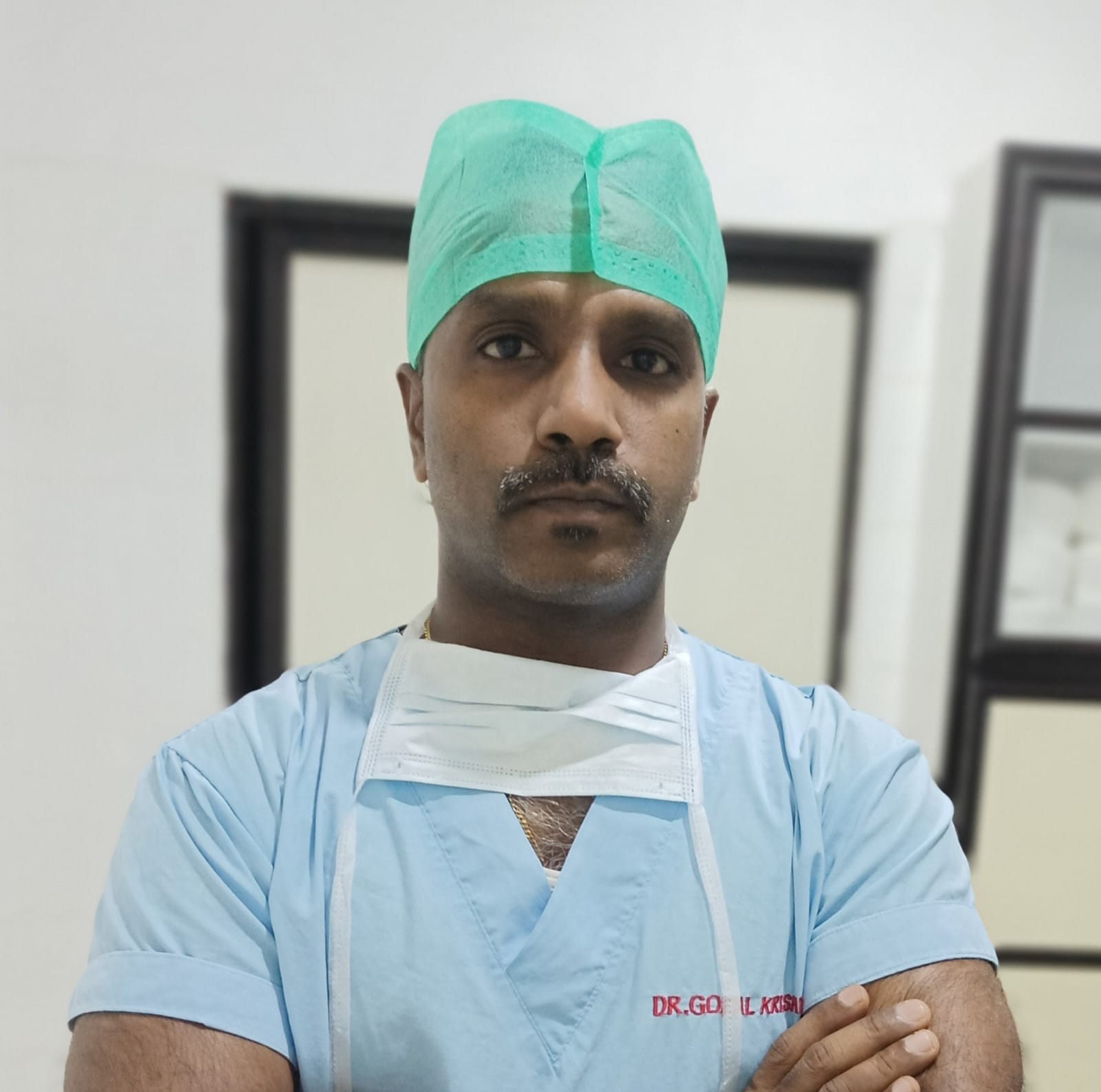 Dr. N. Gopala Krishnan in surgical attire